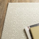 7' X 10' Ivory And Beige Medallion Area Rug