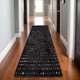 8' Black And Ivory Geometric Runner Rug