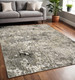 5' X 8' Grey Ivory Beige Charcoal Black Tan And Brown Abstract Power Loom Stain Resistant Area Rug