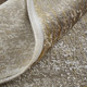 7' X 10' Gold and Ivory Abstract Area Rug With Fringe