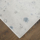 7' X 10' Ivory Blue And Gray Abstract Area Rug