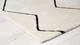 8' X 11' Beige and Black Geometric Power Loom Distressed Non Skid Area Rug