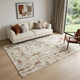 5' X 7' Red and Ivory Abstract Power Loom Area Rug