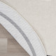 6' Ivory And Black Round Indoor Outdoor Area Rug