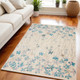 5' X 7' Ivory And Blue Floral Area Rug