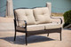 Five Piece Black and Beige Metal Sofa Seating Group With Table