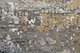 8' X 11' Gray Ivory and Gold Abstract Power Loom Area Rug With Fringe