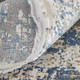 10' X 13' Ivory Tan and Blue Abstract Power Loom Area Rug With Fringe