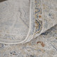 5' X 8' Ivory Tan and Blue Abstract Power Loom Worn Faded Area Rug With Fringe