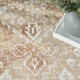 5' X 7' Rust And Ivory Floral Distressed Area Rug