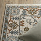 8' X 11' Ivory And Rust Floral Area Rug With Fringe
