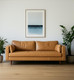 88" Tan Leather Sofa And Toss Pillows With Brown Legs