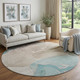 8' Teal Beige And Ivory Abstract Washable Round Rug With UV Protection