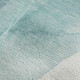 9' X 12' Teal And Ivory Abstract Washable Area Rug With UV Protection