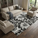 10' X 14' Black And Ivory Floral Washable Area Rug With UV Protection
