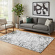 5' X 8' Black And Ivory Abstract Washable Area Rug With UV Protection