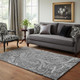 5' X 8' Gray And Ivory Paisley Washable Area Rug With UV Protection