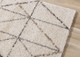 5' X 8' Cream And Gray Tribal Area Rug