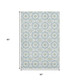 5' X 8' Sky Blue Ivory And Green Geometric Washable Area Rug With UV Protection