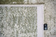 8' X 11' Green Beige And White Abstract Washable Area Rug With UV Protection