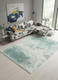 8' Green White And Gray Abstract Washable Round Rug With UV Protection