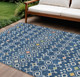 9' X 12' Navy Blue Ivory And Peach Geometric Washable Indoor Outdoor Area Rug