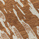 5' X 8' Orange And Ivory Abstract Washable Indoor Outdoor Area Rug