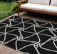 8' X 10' Black And Ivory Geometric Washable Indoor Outdoor Area Rug