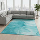 9' X 12' Teal And Ivory Abstract Washable Area Rug With UV Protection