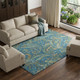 10' X 14' Navy Blue Green And Gold Paisley Washable Area Rug With UV Protection