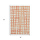 5' X 8' Coral And Beige Polka Dot Washable Area Rug With UV Protection