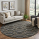 8' Black Gray And Gold Geometric Washable Round Rug With UV Protection