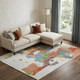 9' X 12' Ivory Orange Blue And Green Abstract Washable Area Rug With UV Protection