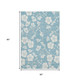 5' X 8' Sky Blue And Ivory Floral Washable Area Rug With UV Protection