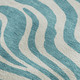 5' X 8' Teal And Ivory Animal Print Washable Area Rug With UV Protection