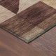 8' Burgundy And Wheat Round Geometric Washable Indoor Outdoor Area Rug