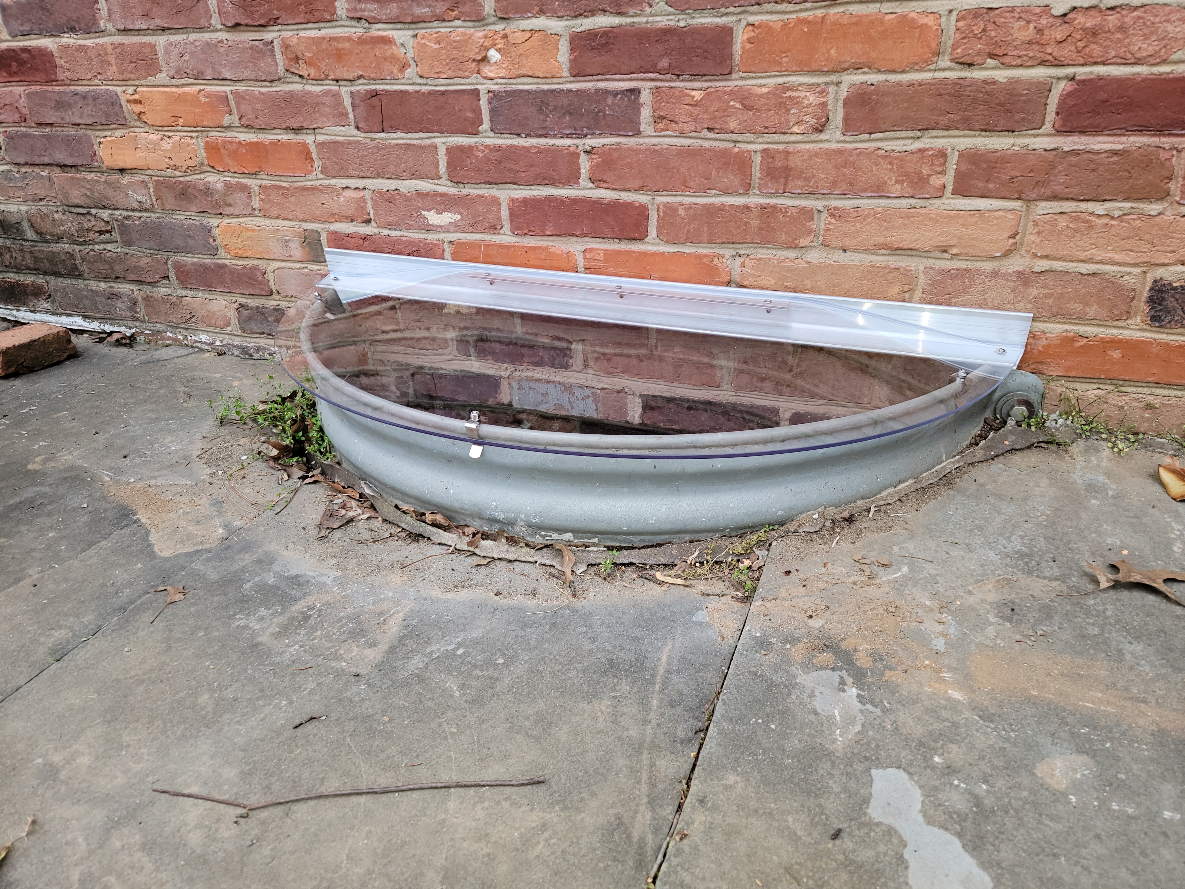 Custom Sloped Cover for Metal Window Wells Custom Sloped Cover for Metal Window Wells