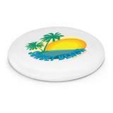 A white frisbee featuring a colorful graphic of a sunset with palm trees and the text "Sunset Beach."