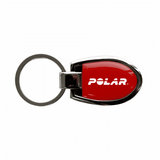 A red keychain with a silver metal keyring and a logo. The design is sleek and compact.