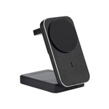 A 3-in-1 charger in black with a textured finish, featuring a circular charging pad and a stand.