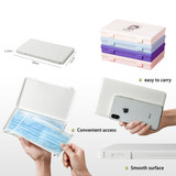 A stack of pastel-coloured mask storage boxes with a smooth surface, designed for convenient access and easy transport.