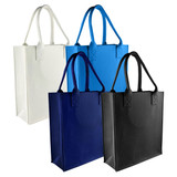 A collection of tote bags in white, blue, navy, and black, each with sturdy handles and a branding logo.