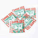 A collection of stickers featuring a cartoon teacup character and the phrase "I love tea" in red and green colours.