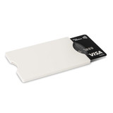 An RFID card protector in white, holding a black Visa debit card. An RFID card protector in white, holding a black Visa debit card.