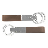 A brown leather key ring with silver metal fittings and multiple key rings attached. Features a logo on the metal section. A brown leather key ring with silver metal fittings and multiple key rings attached. Features a logo on the metal section.