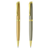 Two metal pens are displayed: one in gold and the other in green, both featuring gold accents and a branding logo.