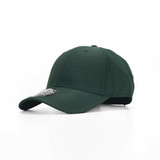 A green cap with a structured design, featuring a logo on the side and a curved brim.