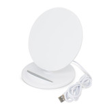 A round white wireless charging stand with a USB cable attached. It has a sleek, minimalist design. A round white wireless charging stand with a USB cable attached. It has a sleek, minimalist design.