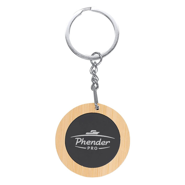 A round bamboo keyring with a silver metal chain and a circular black centre featuring a logo.