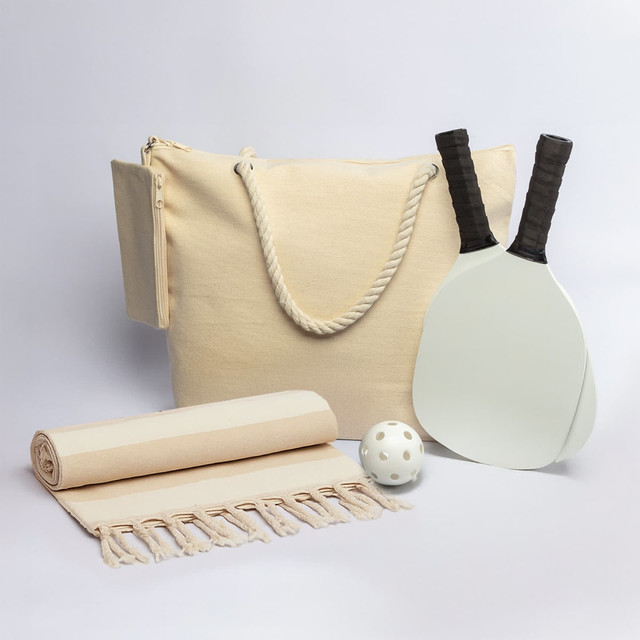 A drink bottle, two paddles, a ball, a towel, and a cream tote bag, all featuring a simple design.